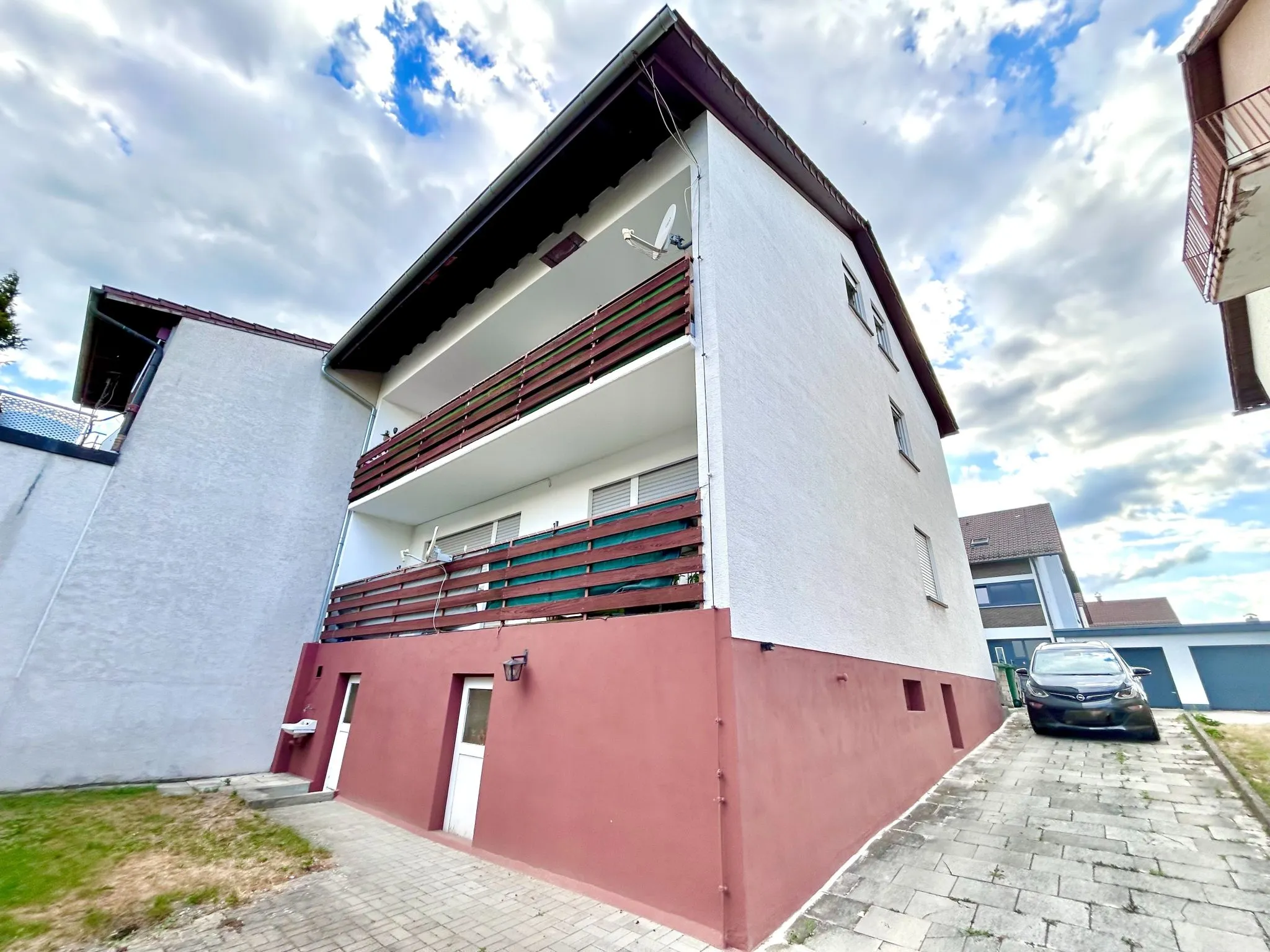 4LangRückansicht Immobilienangebot - Linkenheim-Hochstetten - Alle - Solides Zweifamilienhaus in ruhiger Lage – langjährig vermietet mit Entwicklungspotenzial