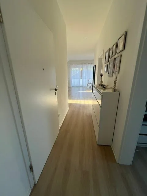 15LangFlur Immobilienangebot - Wörth am Rhein - Alle - Moderne 4-Zimmer-mit Balkon und zwei KFZ-Stellplätzen in Wörth